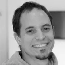 black and white photo of Tamás Cseh, head developer at booked4.us